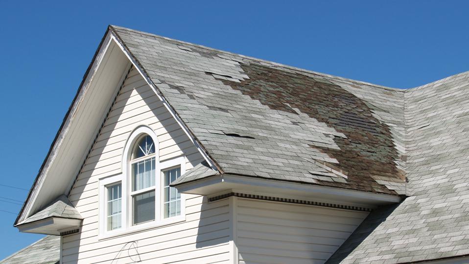 Will homeowners insurance cover shingles blown off?